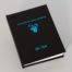 book cover, black linen with turquoise metallic foil stamp